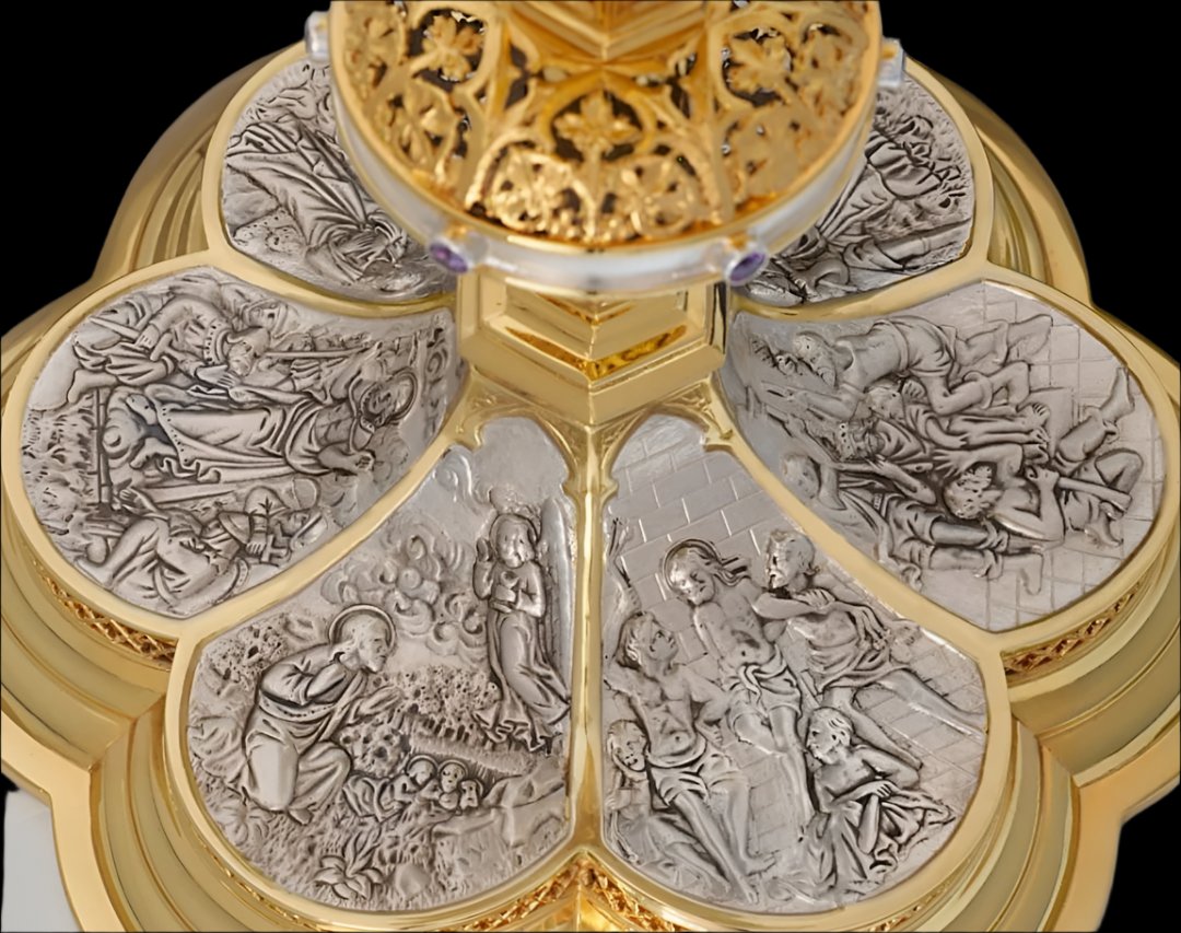 Chalice & Scale Paten in neo-gothic style with scenes from the New
Testament , 9” Ht. sold by The Clergy Store