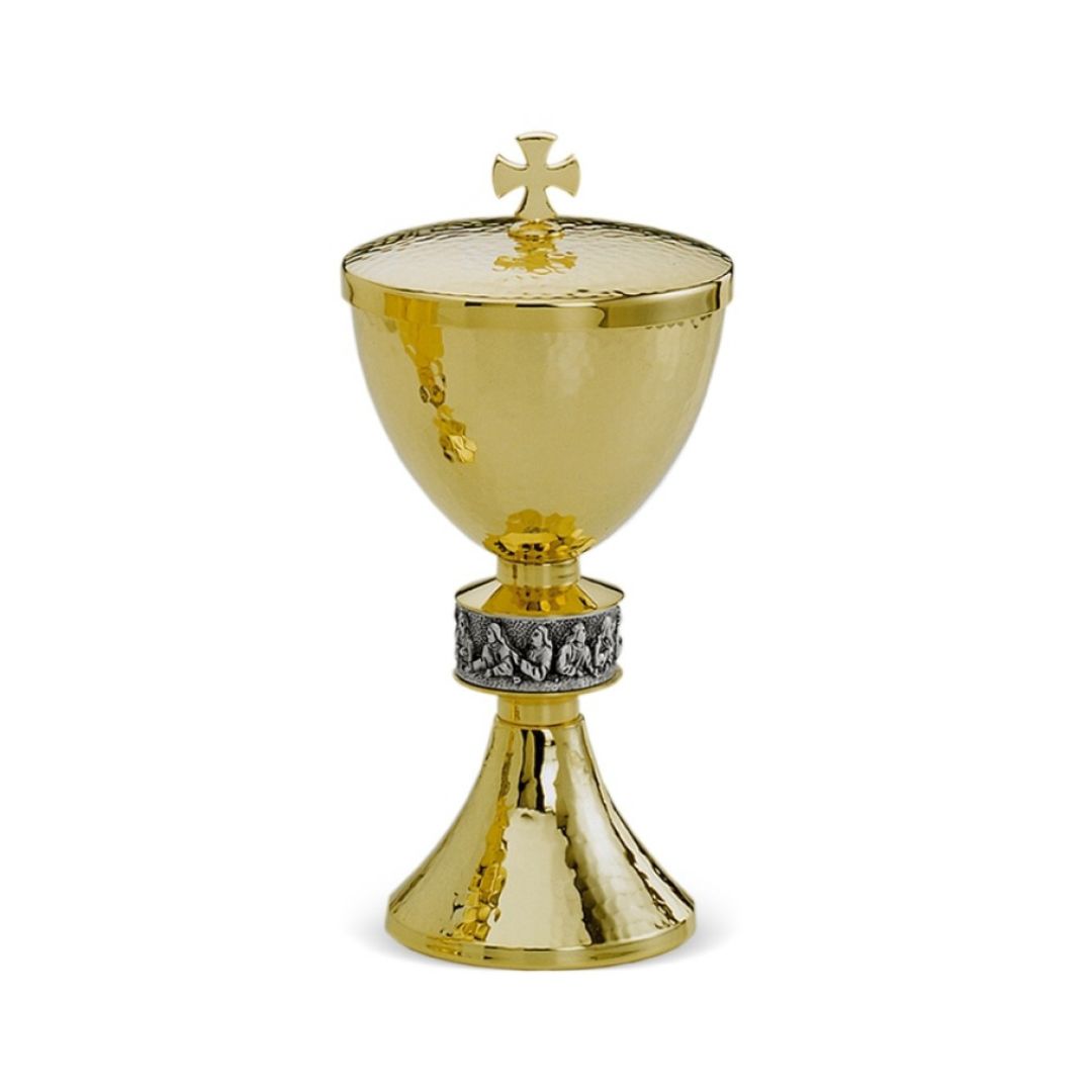 Ciborium with hand chiseled Last Supper around the node. By Desta Italy and sold by The Clergy Store