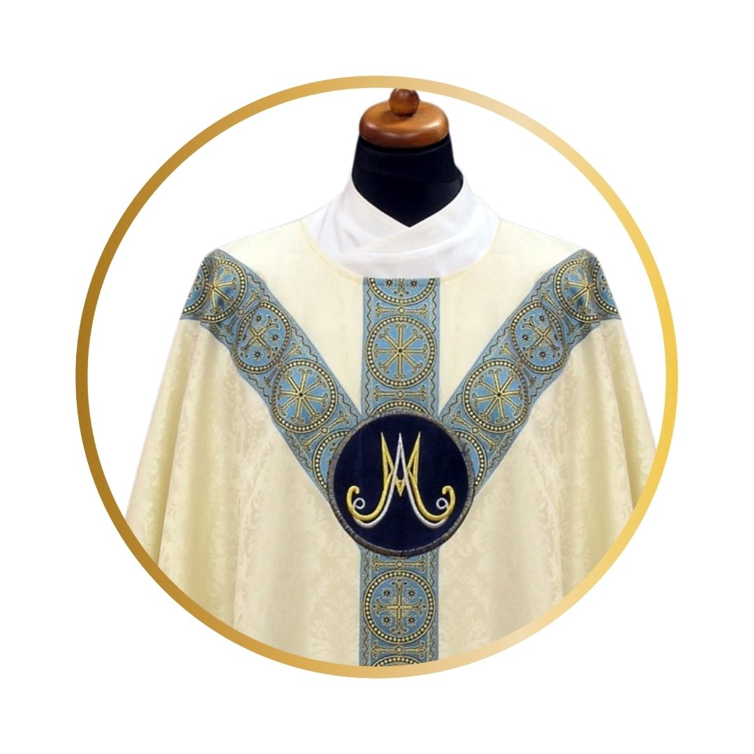 Marian Chasuble St. Andrew style with velvet medallion on ivory damask and trimmed with high quality galloon bands.