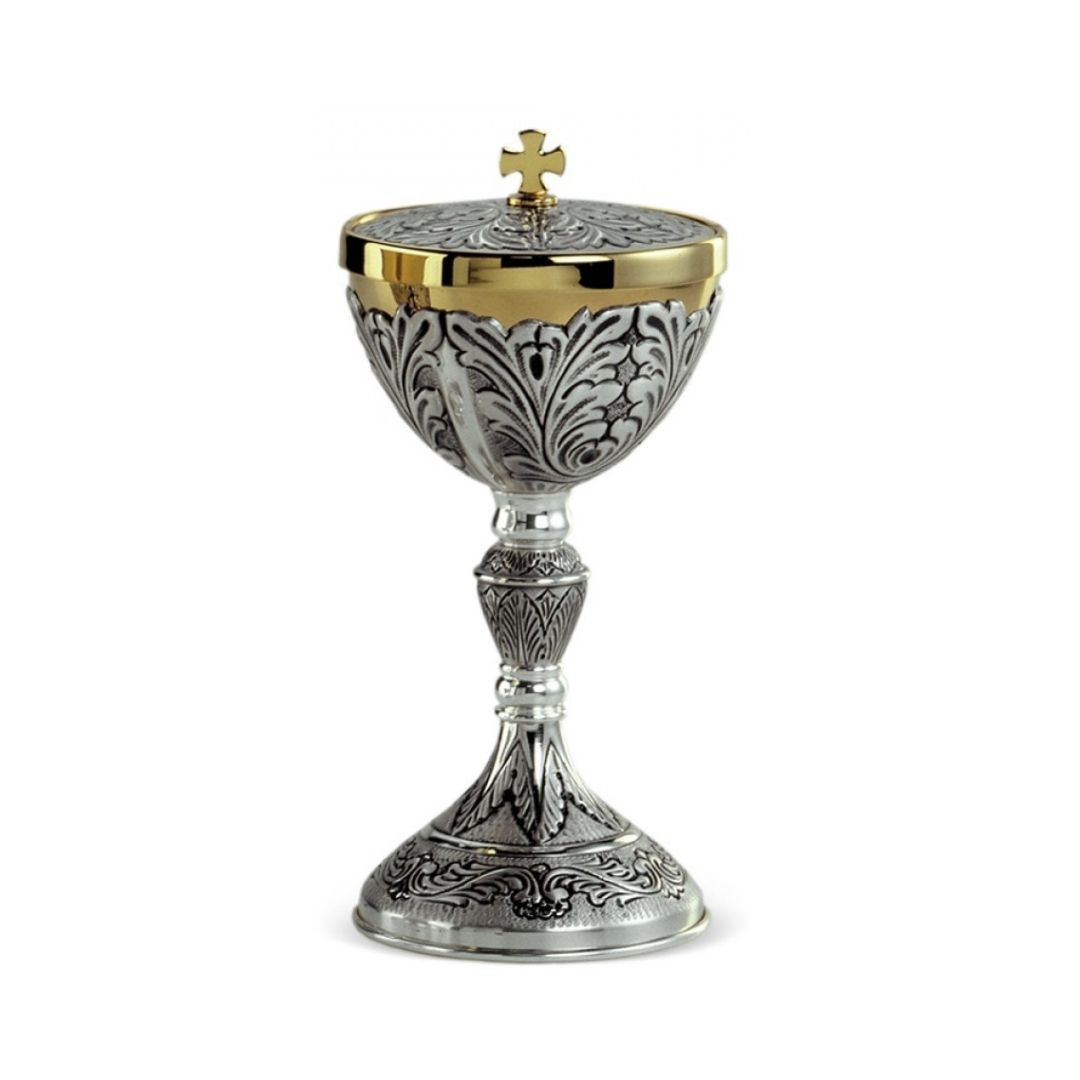 Ciborium hand chiseled floral design. By Desta Italy and sold by The Clergy Store