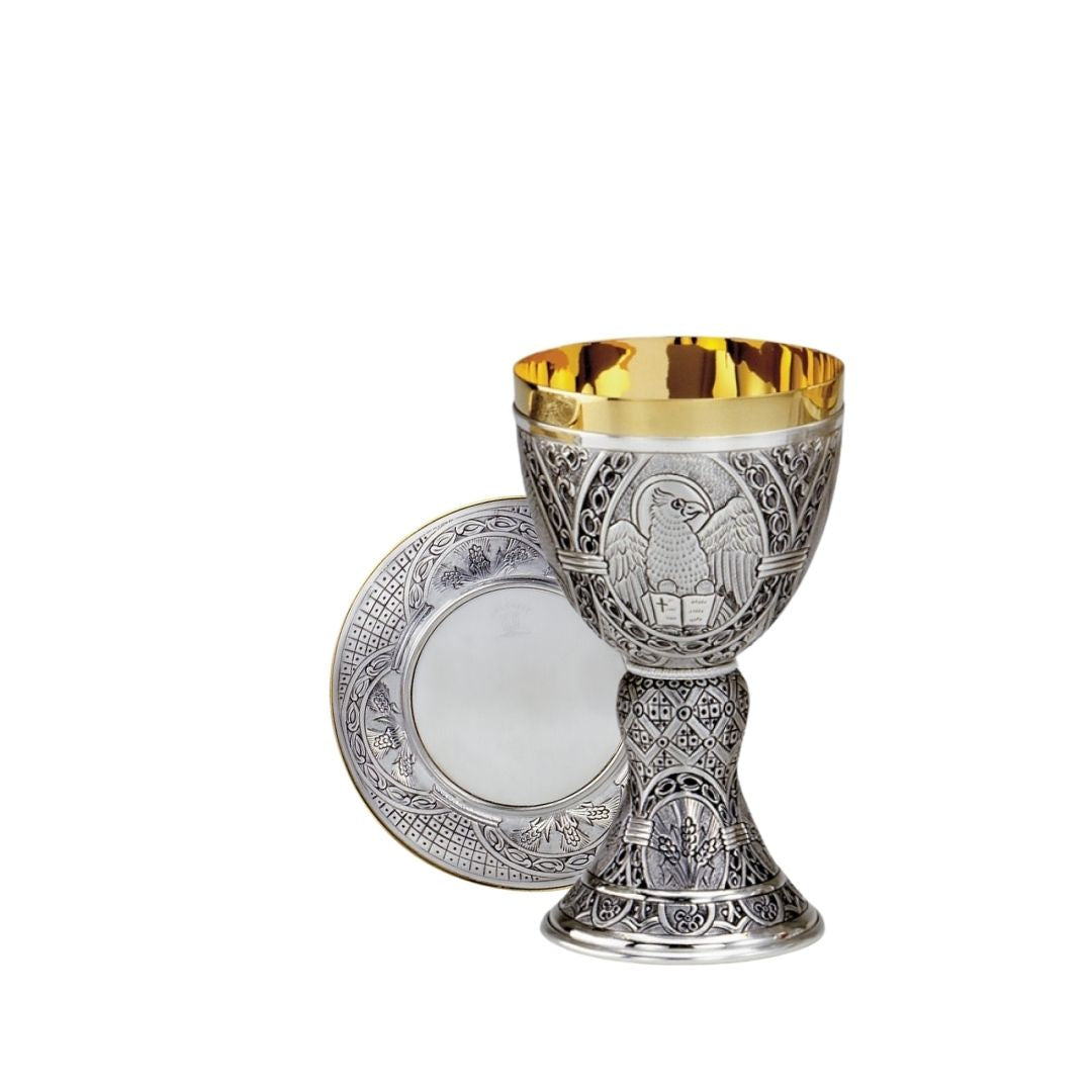 Chalice and Paten hand chiseled images of the Saints. By Desta Italy and sold by The Clergy Store