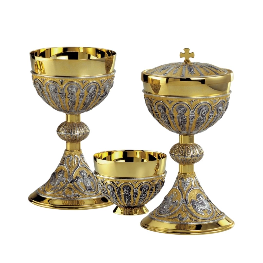 Chalice and Ciborium set two tone silver and gold finish with hand chiseled filigree design. By Desta and sold by The Clergy Store