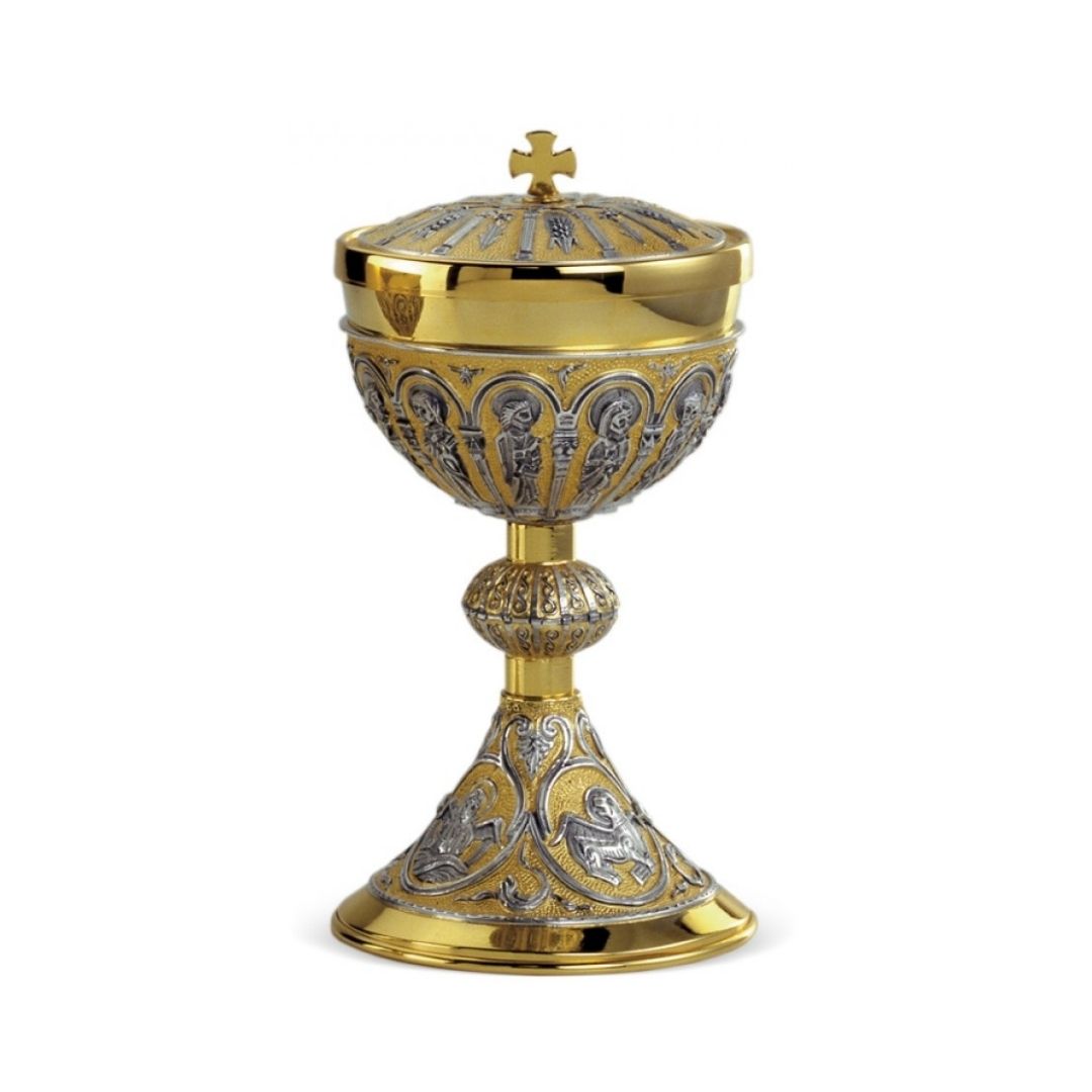 Ciborium two tone silver and gold finish with hand chiseled filigree design. By Desta and sold by The Clergy Store