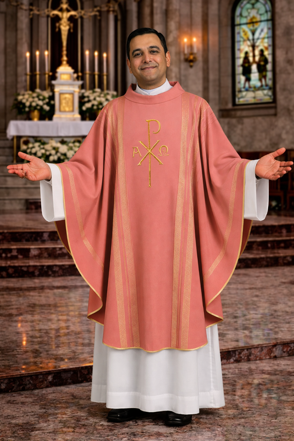 Priest in pink liturgical vestment with gold emblem in a church setting