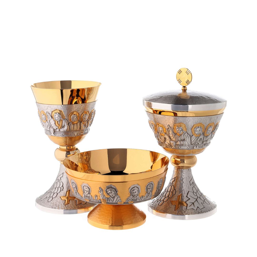 Religious sacred vessels with chiseled image of the Last Supper. Made by Mollica Italy and sold by The Clergy Store
