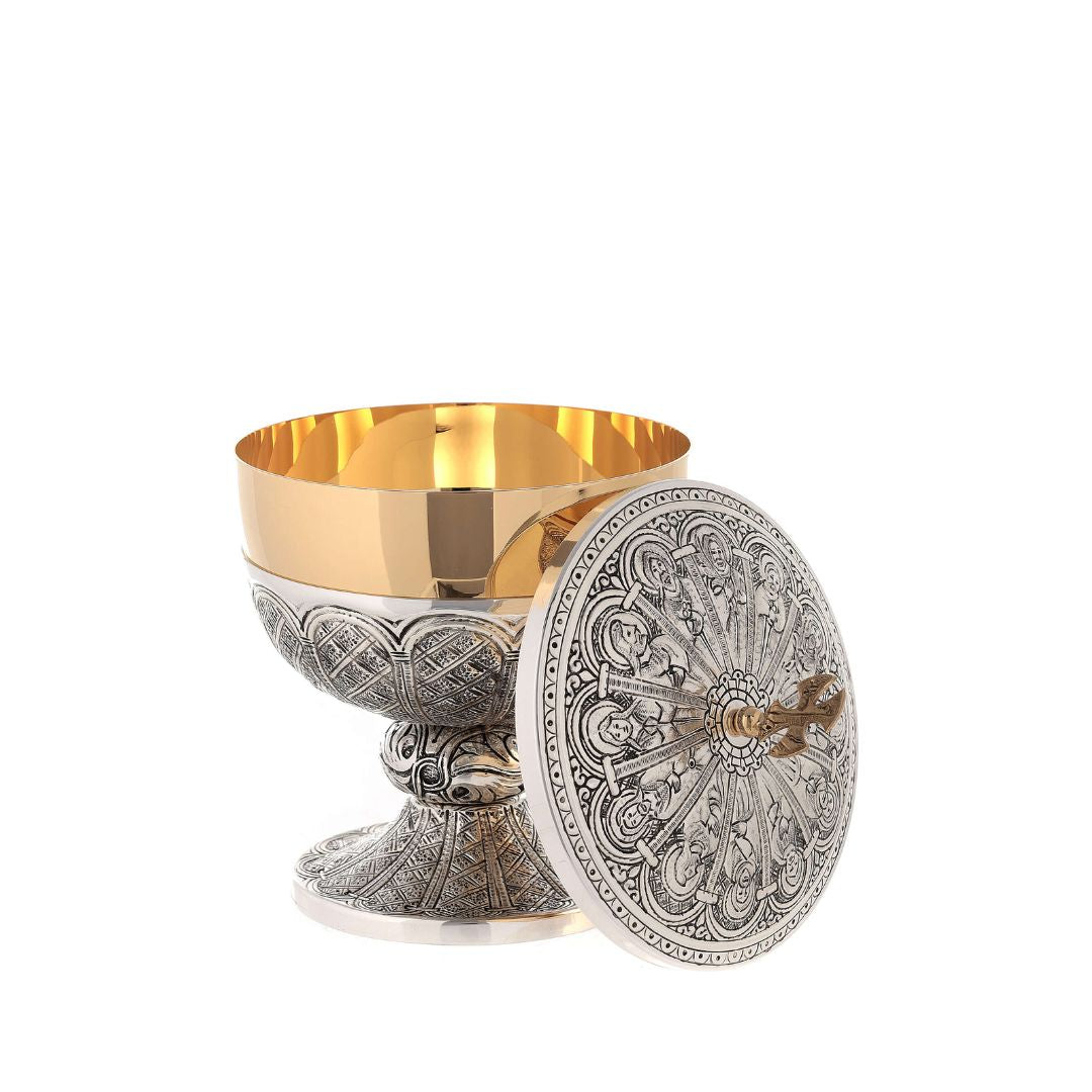 Ciborium two tone finish with images of the 12 apostles. Made in Italy and sold by The Clergy Store