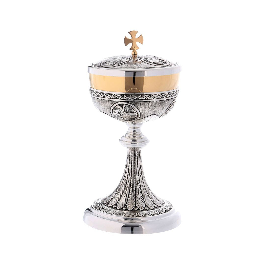 Ciborium two tone finish with images of the 4 evangelist. Made in Italy and sold by The Clergy Store