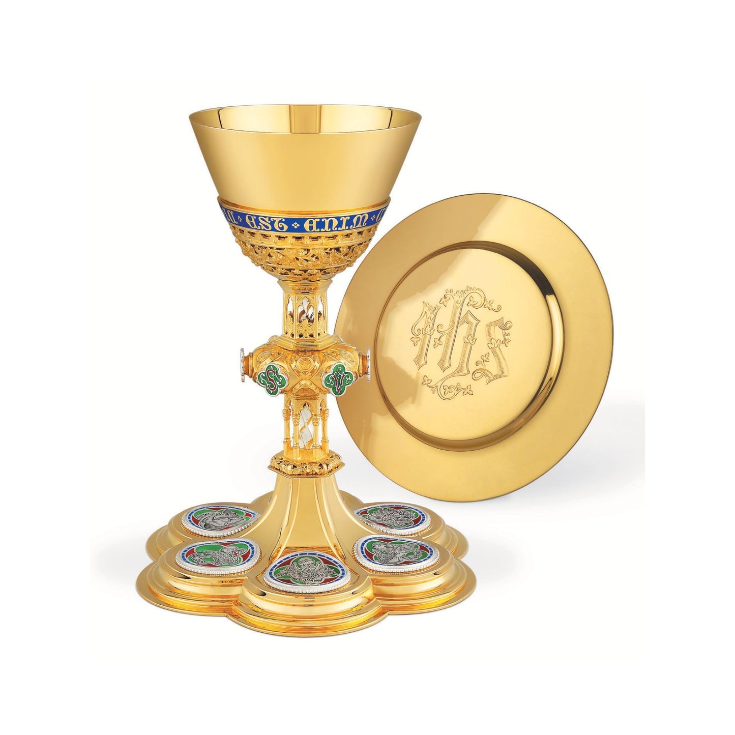 Chalice & Dish Paten in neo-gothic style with medallions depicting
symbols of Christ and of the Four Evangelists, and cup inscription: “HIC EST ENIM CALIX SANGUINIS MEI” , 8 7/8” Ht. sold by The Clergy Store