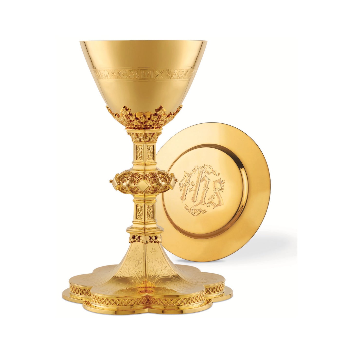 Chalice & Dish Paten in neo-gothic style with scenes from the Old Te
stament and cup inscription: “HIC EST ENIM CALIX SANGUINIS MEI”
8 5/8” Ht. sold by The Clergy Store