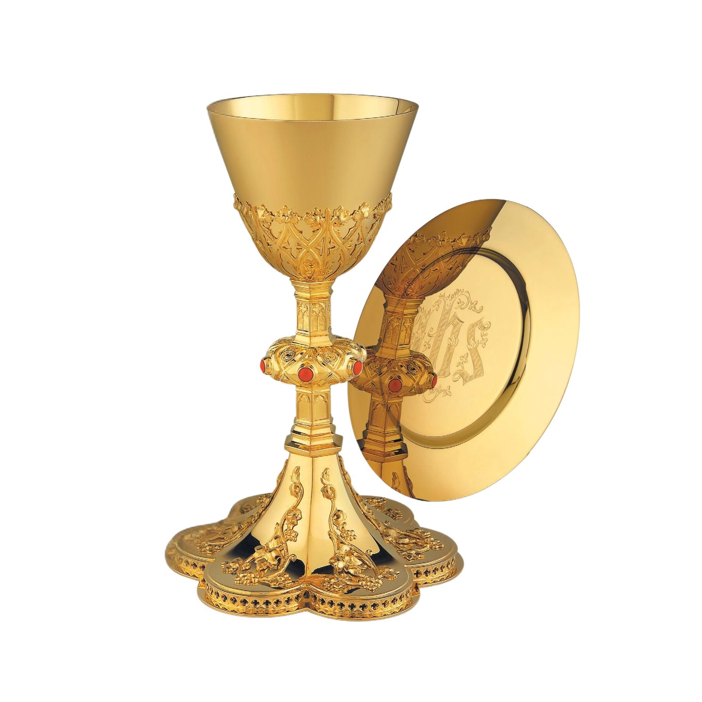 Chalice & Paten in neo-gothic style with elaborate floral design 8 5/8”
Ht. Sold by The Clery Store