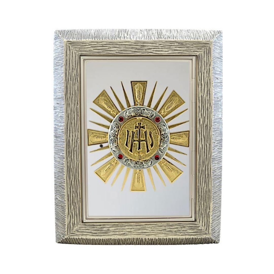 Bronze wall tabernacle with a IHS design in a silver two tone finish. Made in Italy and sold by The Clergy Store