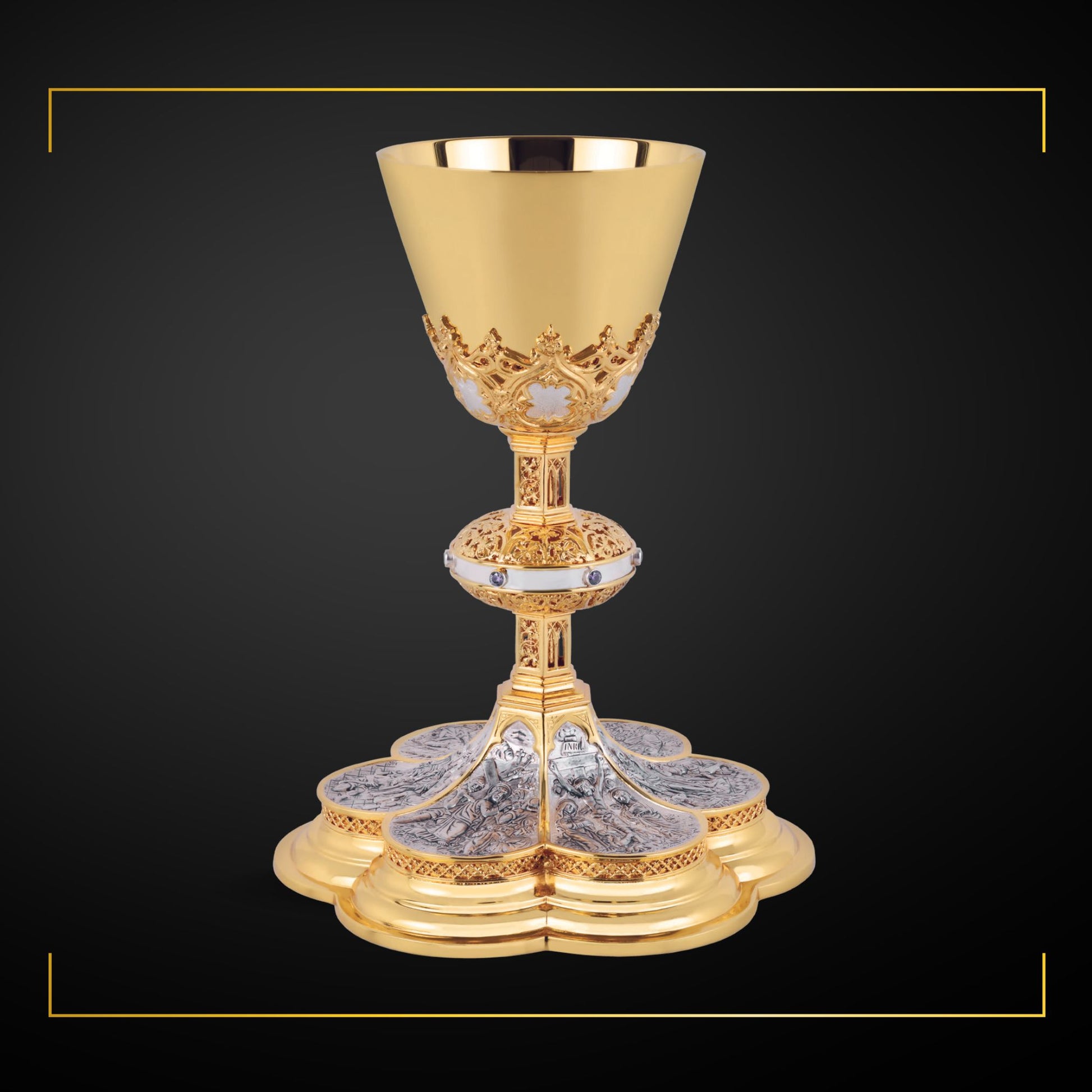 Chalice & Scale Paten in neo-gothic style with scenes from the New 
Testament ,  9” Ht.  sold by The Clergy Store