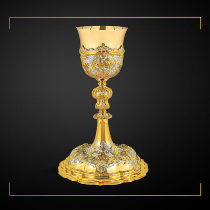 Chalice & Scale Paten in baroque style, 11” Ht. sold by The Clergy Store