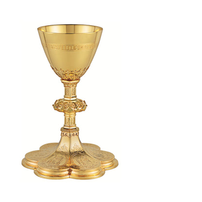 Chalice & Scale Paten in neo-gothic style with scenes from the Old 
Testament, and cup inscription: “HIC EST ENIM CALIX SANGUINIS MEI”  9” Ht. sold by The Clergy Store