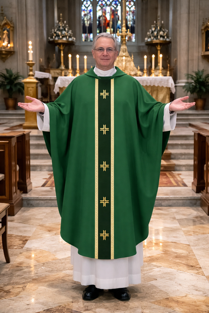 Priest in green liturgical  monastic style vestment with gold crosses standing in a church.