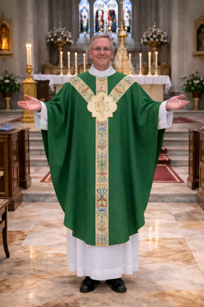 Priest in a green gothic liturgical vestment with IHS embroidery standing in a church.