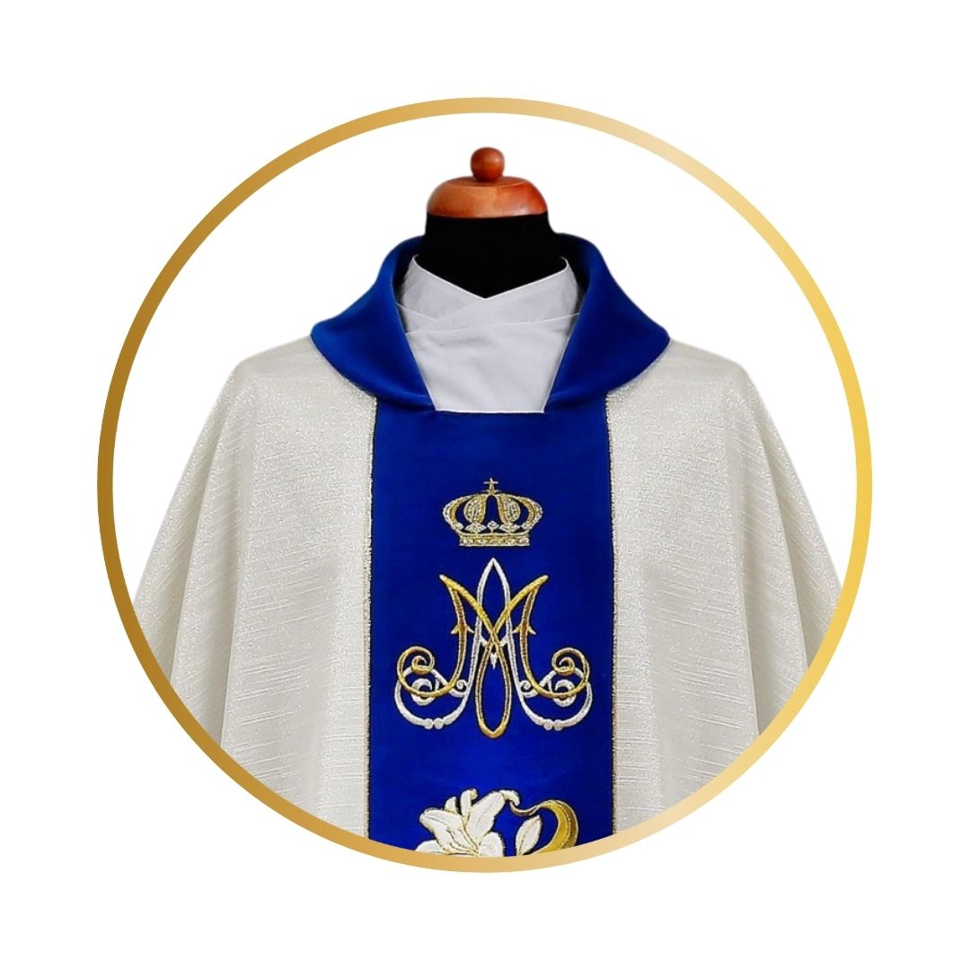 Ava Maria chasuble with embroidered Lilly's on blue velvet orphrey.