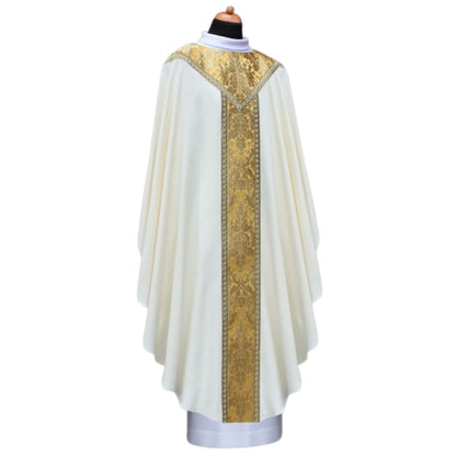 Chasuble with metallic brocade with v-shape neckline trimmed in galloon.