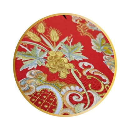 Priest stole with IHS embroidered design in red.