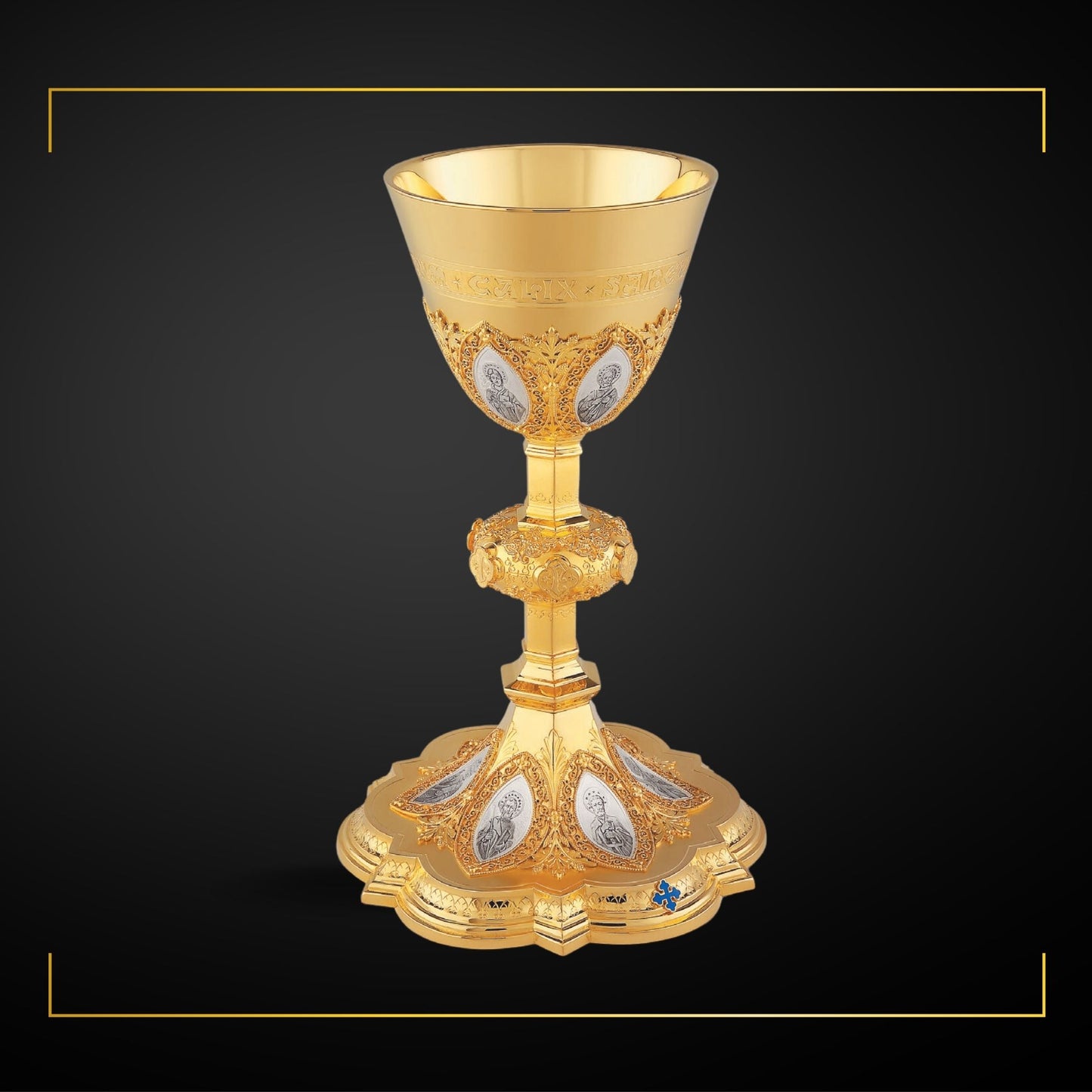 Chalice in neo-gothic style with medallions of the Twelve Apostles and cup inscription: “HIC EST ENIM CALIX SANGUINIS MEI” ,  9 7/8” Ht. Sold by The Clergy Store