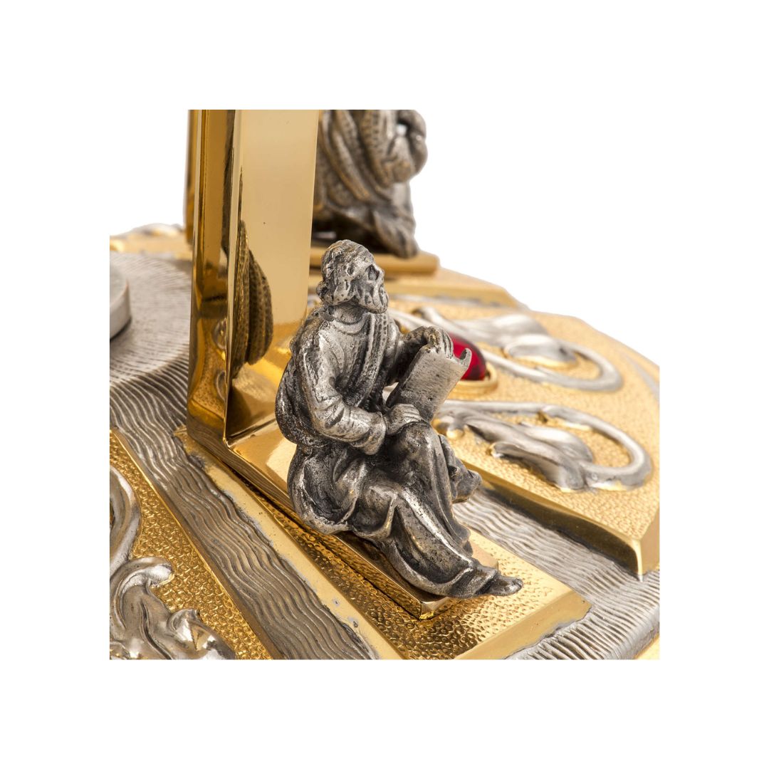 Thabor monstrance stand with silver four evangelist, lilies and red stones. Made in Italy and sold by The Clergy Store