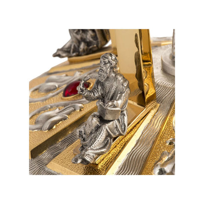 Thabor monstrance stand with silver four evangelist, lilies and red stones. Made in Italy and sold by The Clergy Store