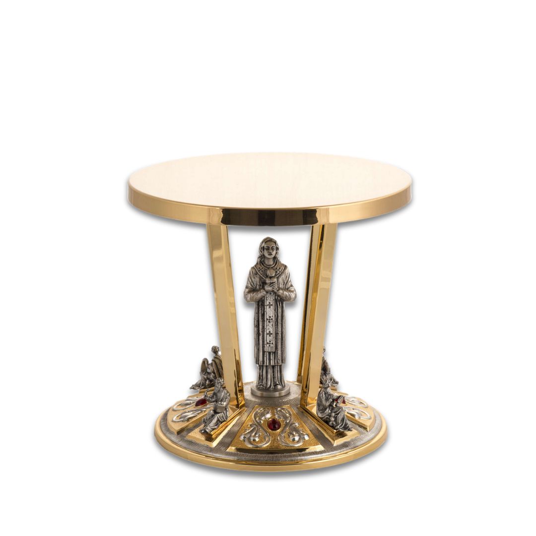 Thabor monstrance stand with silver four evangelist, lilies and red stones. Made in Italy and sold by The Clergy Store