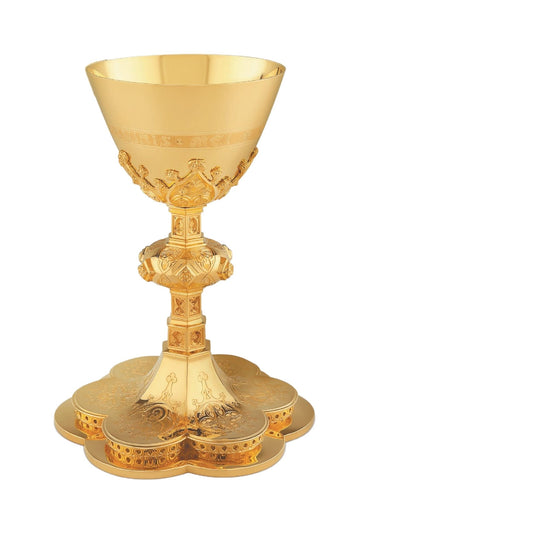 Chalice & Scale Paten in neo-gothic style with engraved images of the Holy Family and cup inscription: “HIC EST ENIM CALIX SANGUINIS 
MEI” , 8 3/4” Ht.  Sold by The Clergy Store