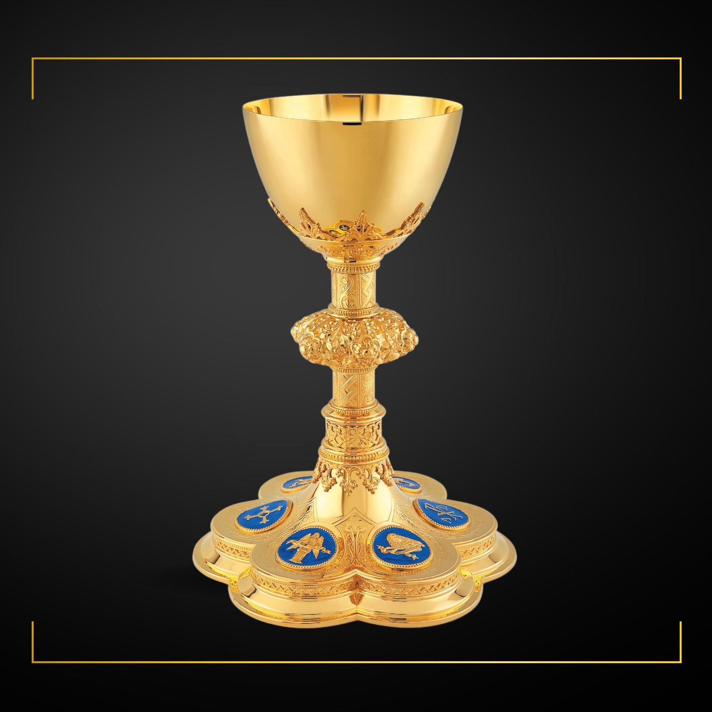 Chalice & Scale Paten in neo-gothic style with enameled medallions 
depicting symbols of the Four Evangelists, cross and Chi Rho symbol, 10 1/4” Ht. sold by The Clergy Store