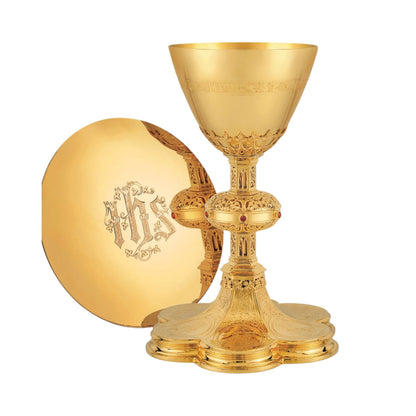 Chalice & Paten in neo-gothic style with engraved images of the Crucifixion, the Mother of God and saints: Peter, Paul, John and Joseph, and cup inscription: “HIC EST ENIM CALIX SANGUINIS MEI” Sold by The Clergy Store