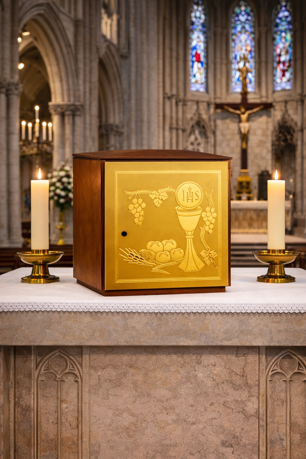 Single door tabernacle with chiseled image of a chalice, grapes, and ears of wheat sourrounded by a wood casing. Made in Italy and sold by The Clergy Store