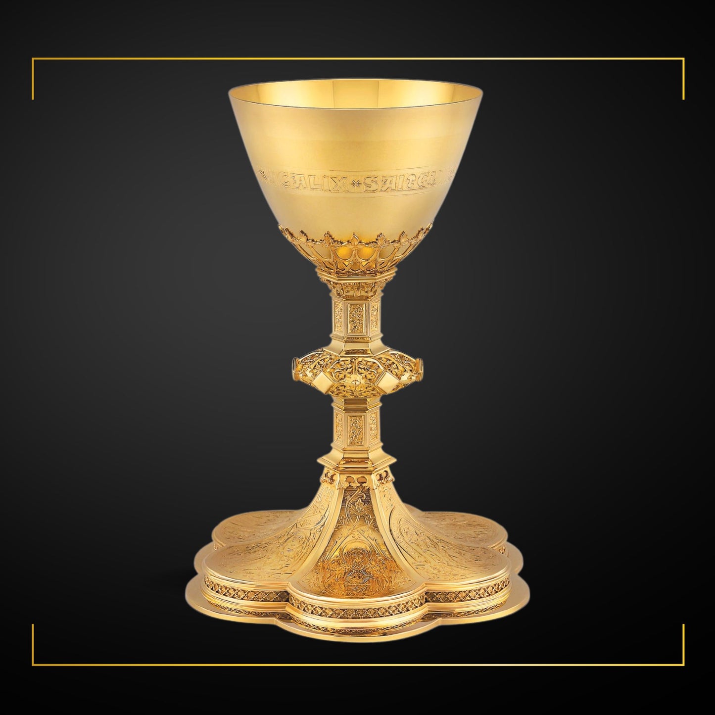 Chalice & Paten in neo-gothic style with engraved images saints and 
cup inscription:: “HIC EST ENIM CALIX SANGUINIS MEI” , 8 5/8” Ht. sold by The Clergy Store