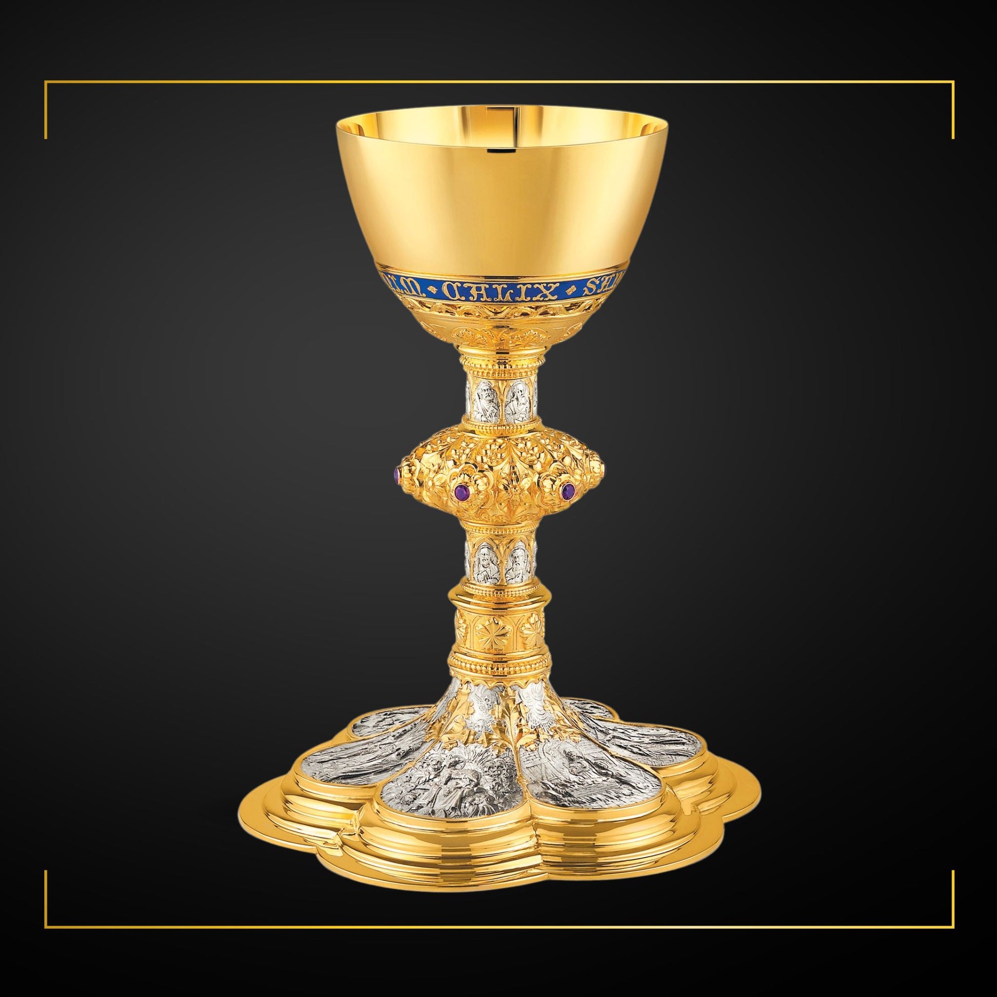 Chalice & Scale Paten in neo-gothic style with scenes from the New 
Testament and cup inscription: “HIC EST ENIM CALIX SANGUINIS MEI” 
9 5/8” Ht. sold by The Clergy Store