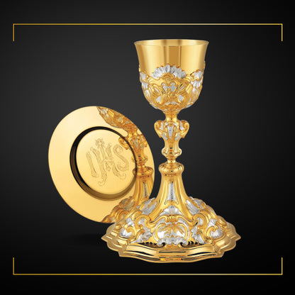 Chalice & Paten in baroque style, 10 1/4” Ht.  sold by The Clergy Store