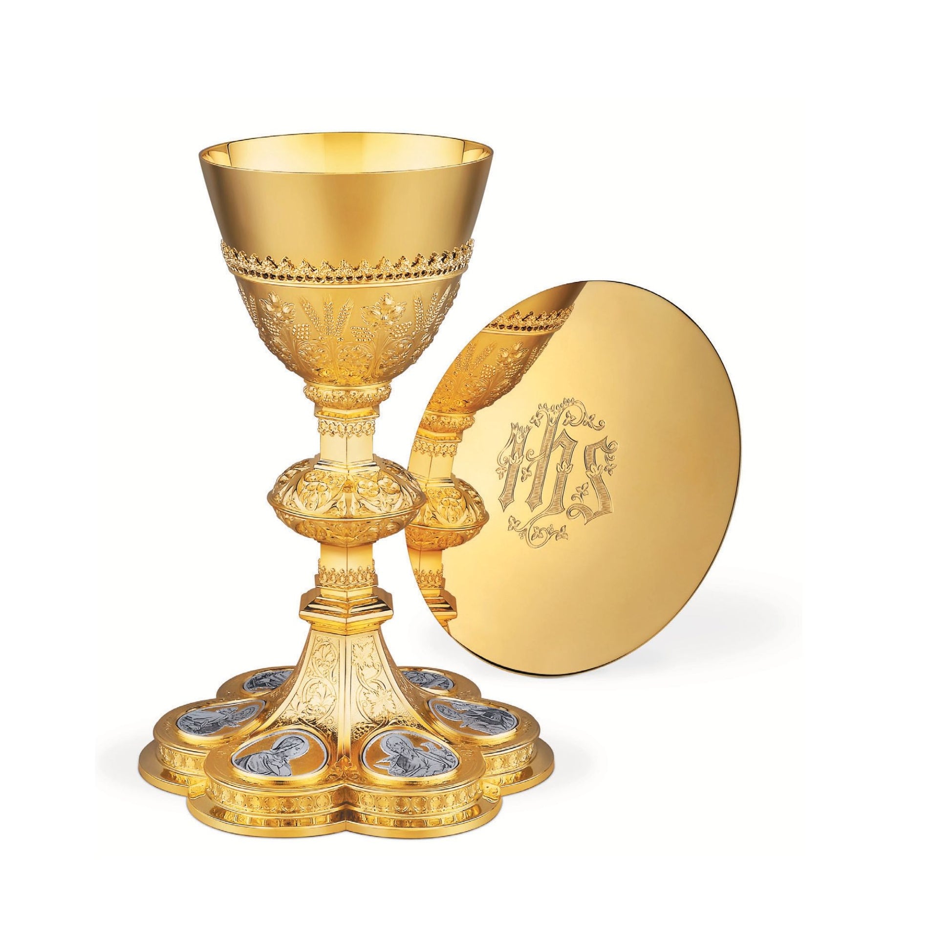 Chalice & Scale Paten in neo-gothic style with medallions of Jesus 
Christ, Mary and the Four Evangelists,  9 1/4” Ht. sold by The Clergy Store