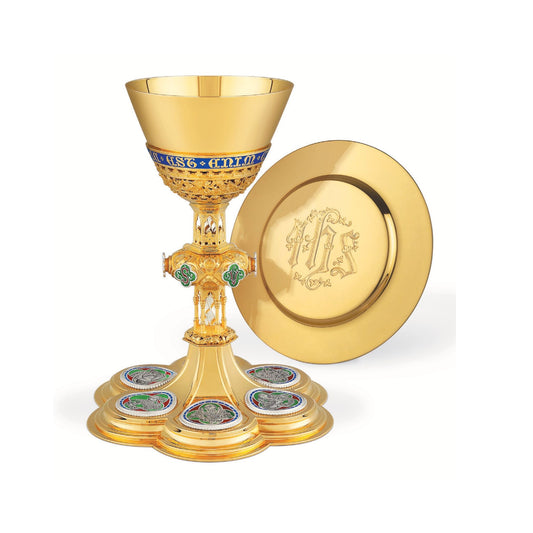 Chalice & Dish Paten in neo-gothic style with medallions depicting 
symbols of Christ and of the Four Evangelists, and cup inscription: “HIC EST ENIM CALIX SANGUINIS MEI” , 8 7/8” Ht. sold by The Clergy Store