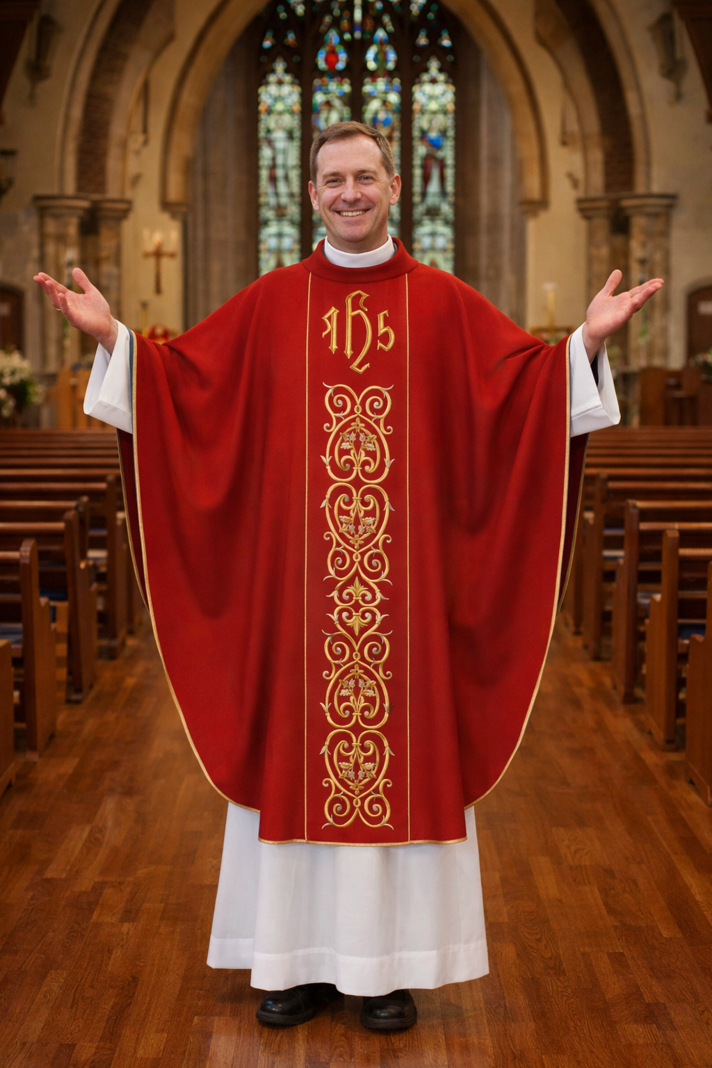 Priest in red liturgical vestment with gold embroidery in a church setting