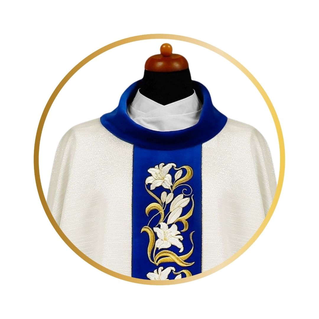 Marian chasuble with embroidered Lilly's on blue velvet orphrey.