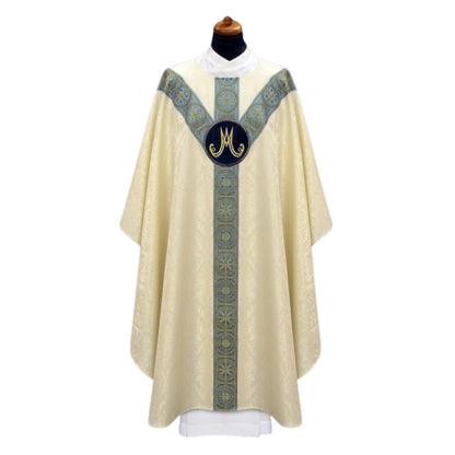 Marian Chasuble  St. Andrew style with velvet medallion on ivory damask and trimmed with high quality galloon bands.