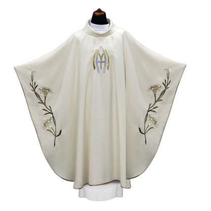 Ava Maria chasuble with embroidered lilly's and trimmed in gold.