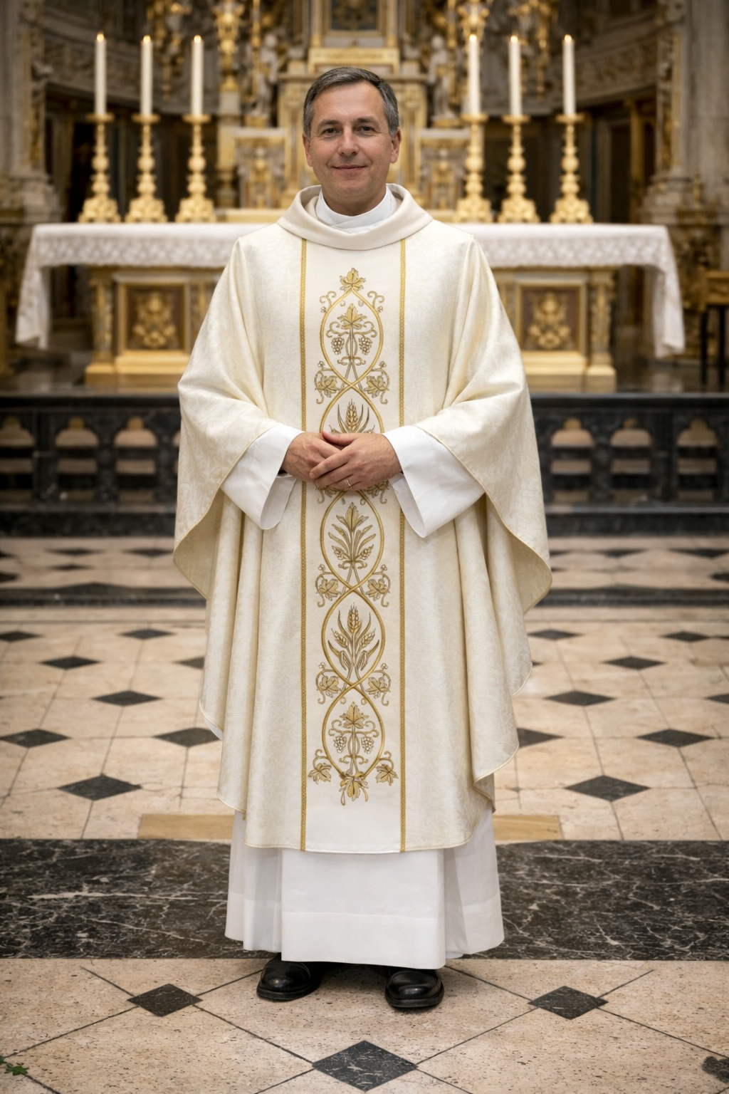 Priest in ornate white and gold vestment standing in a church.