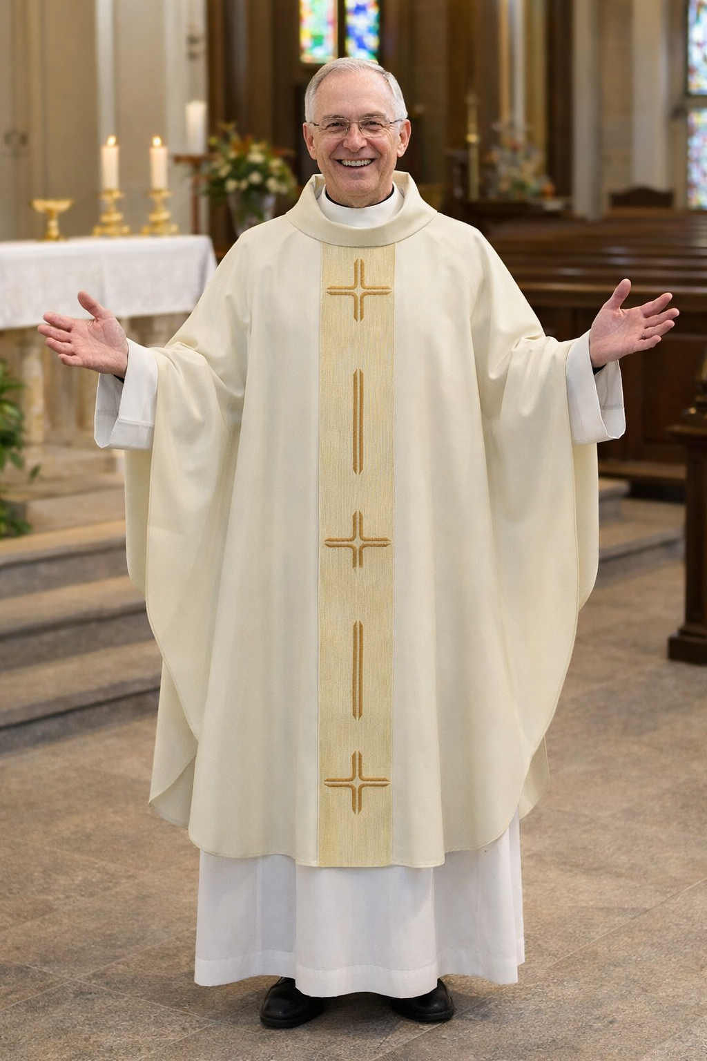 Priest in liturgical  ivory vestments standing in a church setting