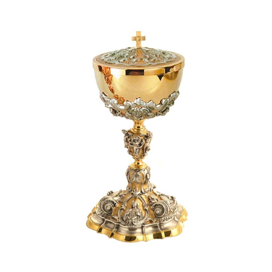 Ciborium in two tone finish with image of Jesus, Joseph, and Mary in a gold plated finish.