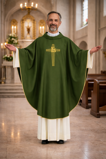 Priest in a green chasuble with a cross emblem in a church setting