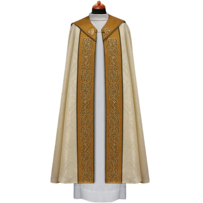 Liturgical cope vestment with rich ornate embroidery and cross on the hood. Made in Poland and sold by The Clergy Store