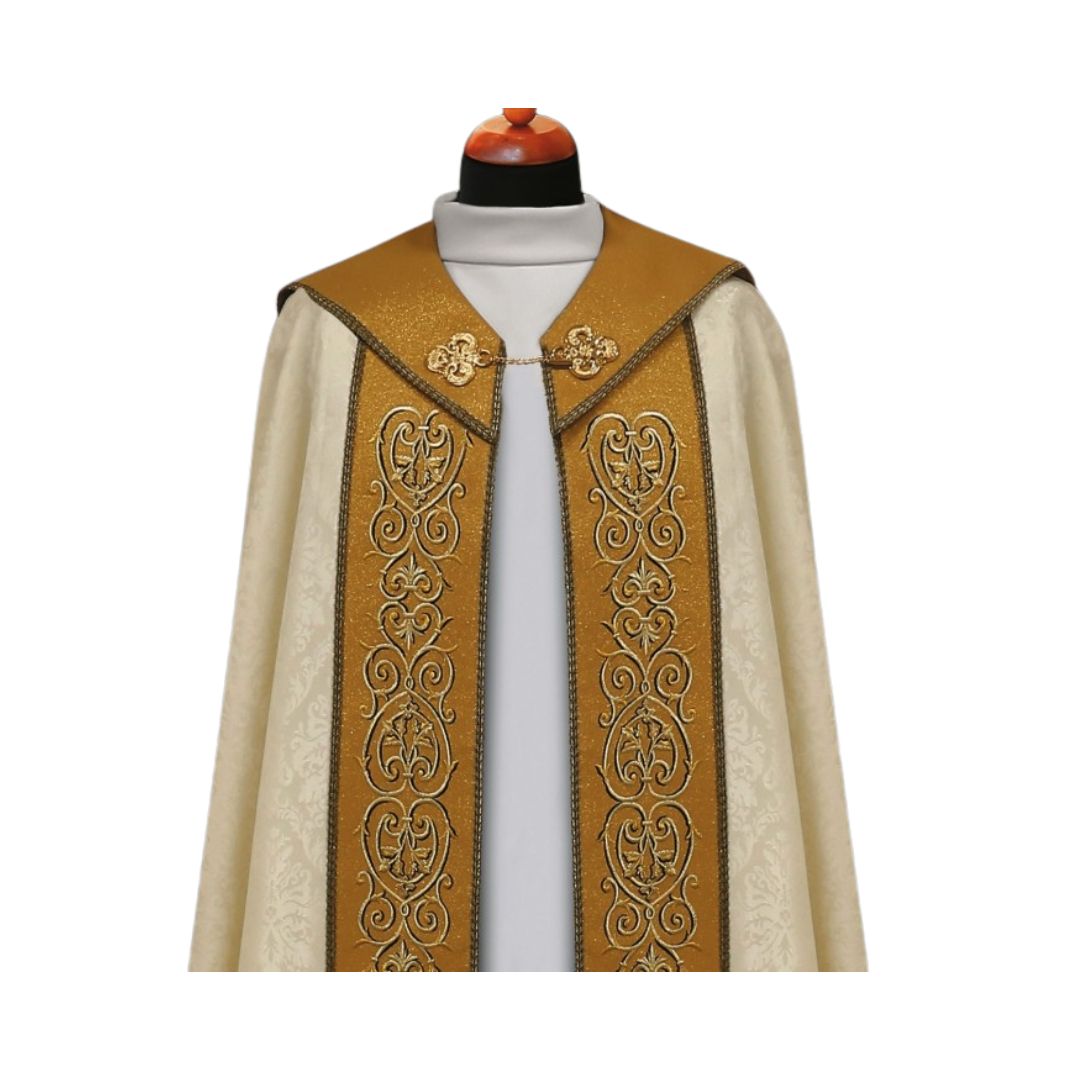 Liturgical cope vestment with rich ornate embroidery and cross on the hood. Made in Poland and sold by The Clergy Store