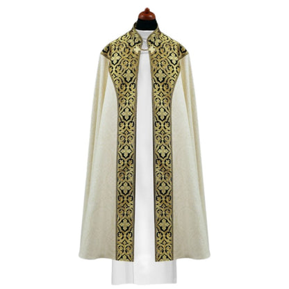 Liturgical cope made with black and gold brocade on ivory damask. Made in Poland and sold by The Clergy Store