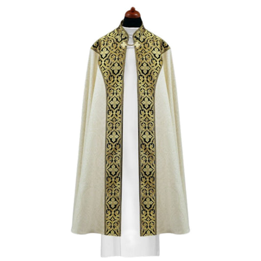 Liturgical cope made with black and gold brocade on ivory damask. Made in Poland and sold by The Clergy Store
