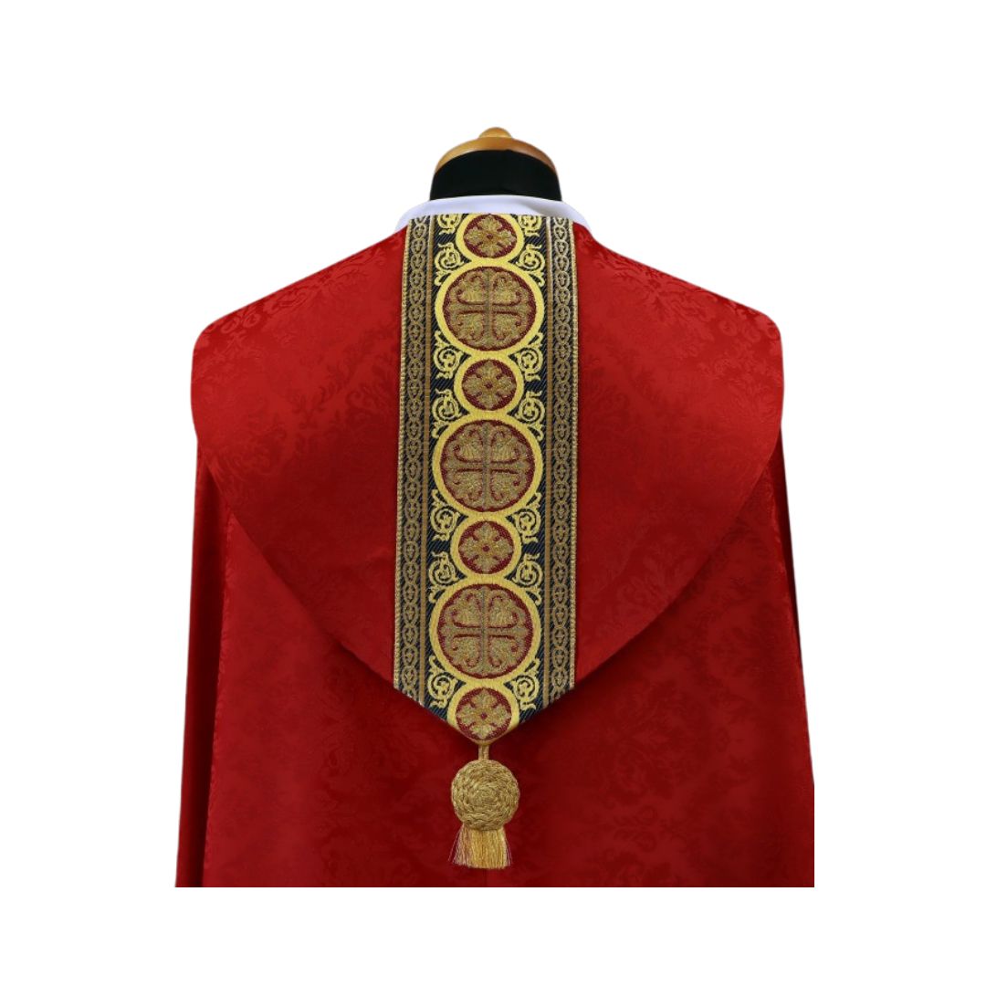Cope in lightweight red damask with brocade galloon with crosses. Made in Poland and sold by The Clergy Store