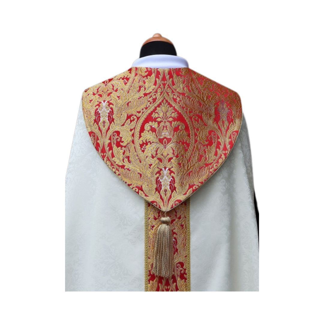 Cope made in lightweight damask adorned with a coronation style brocade with Tassel. Made in Poland and sold by The Clergy Store